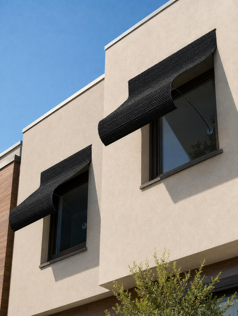 Concept rendering of an UnBeam awning shading a window on a residential apartment unit.